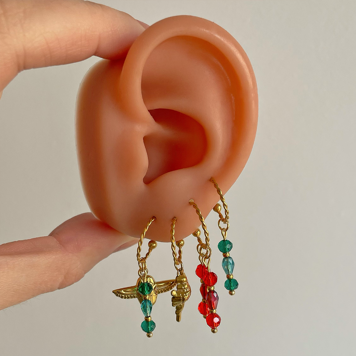 Charm Hannia Rojo Oro