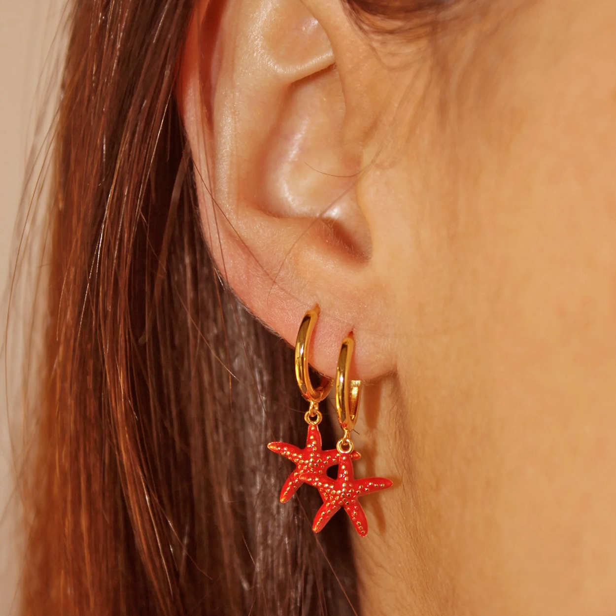 Aros Estrella De Mar Roja Oro